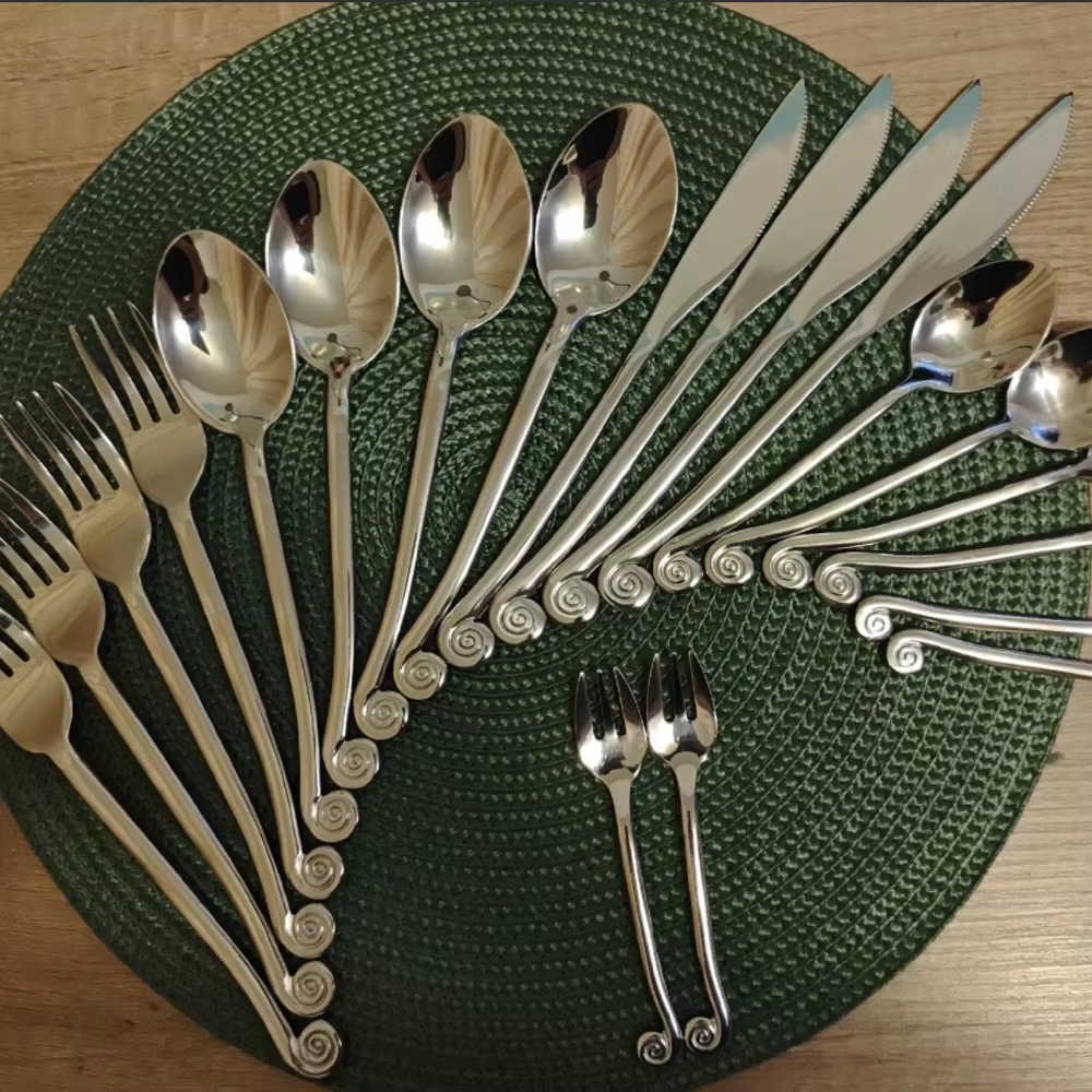 Couverts impressionnants, Design créatif célèbre, poignée d'escargot, service de vaisselle, processu