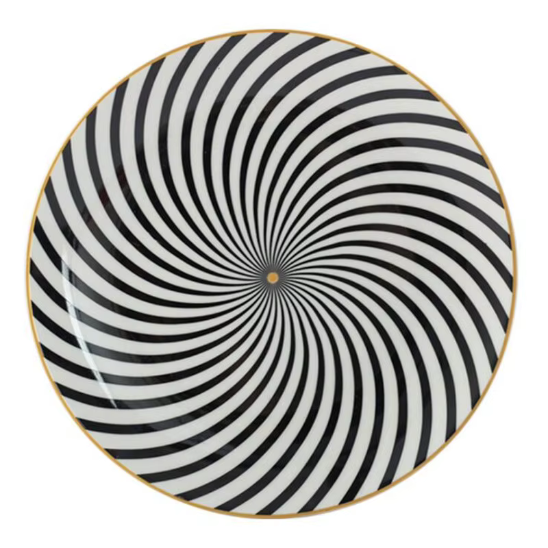 Assiette ronde avec incrustation dorée