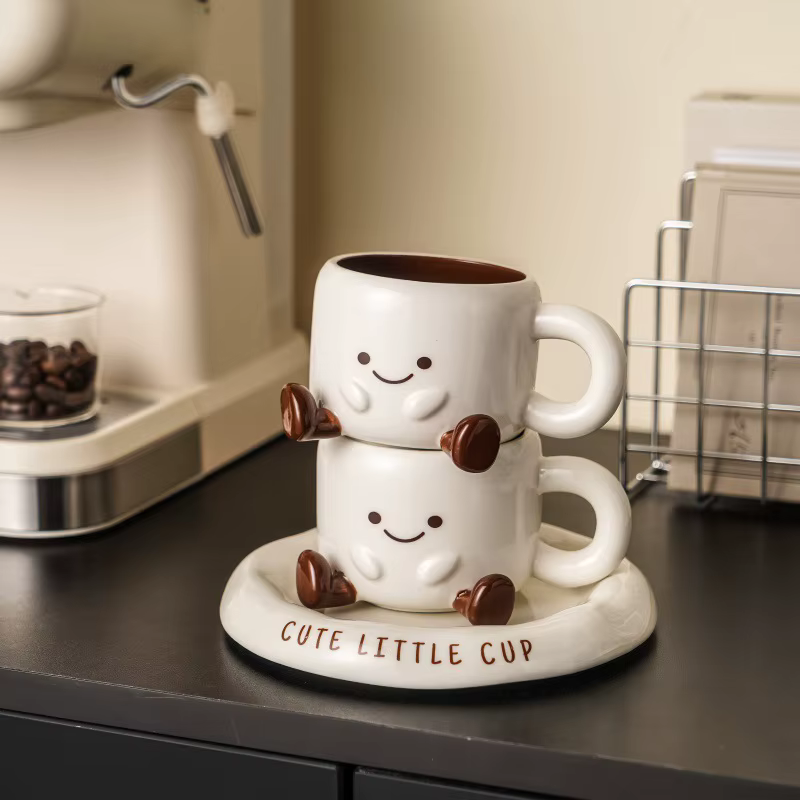 Mignonne petite tasse à café en céramique avec visage souriant et soucoupe, ensemble de tasses créatives de style dessin animé pour café, thé, lait
