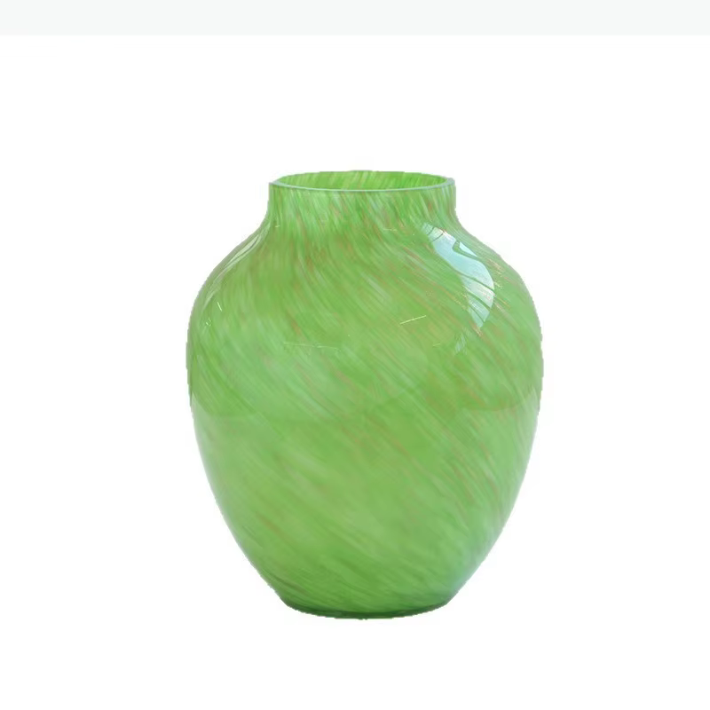 Vase en verre vert peint