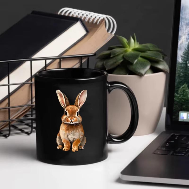La tasse à café en céramique imprimé animal lapin noir convient à la maison