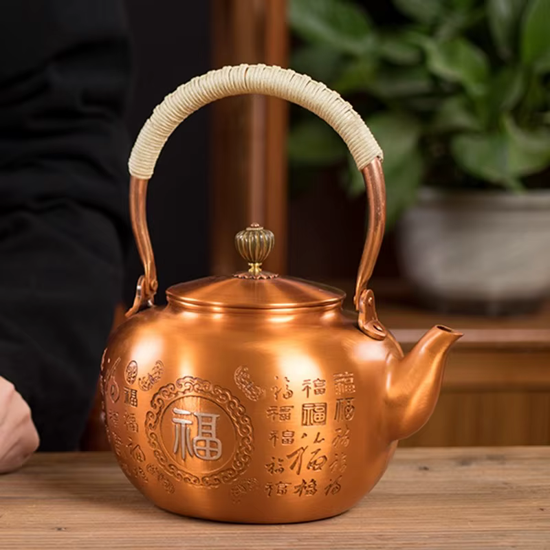 Théière en cuivre argenté doré faite à la main