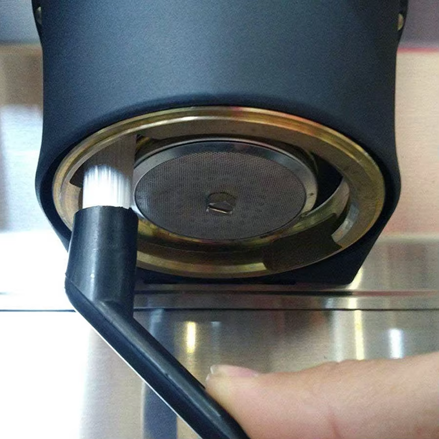 Brosse de nettoyage pour machine à café