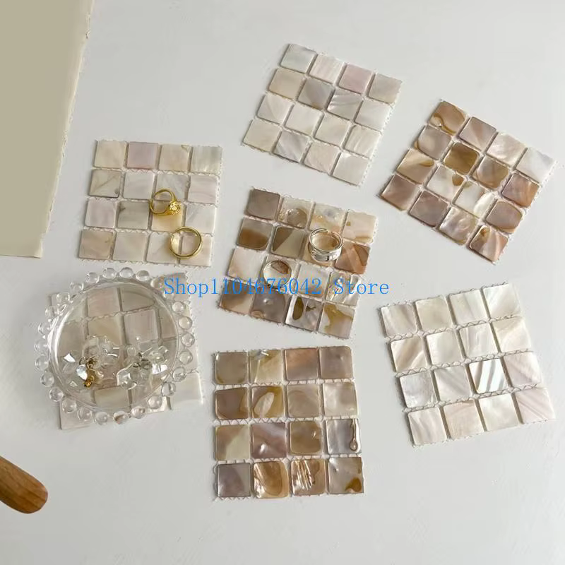 Sous-verres carrés en coquille conque naturelle