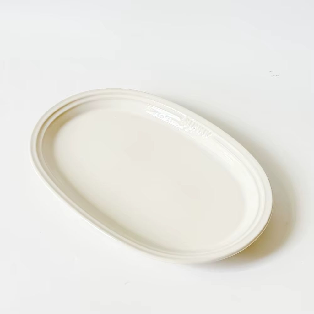 Assiettes de service ovales en porcelaine