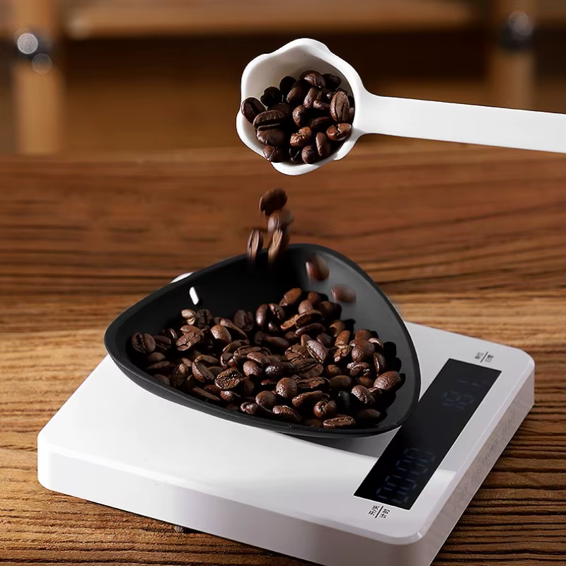 Tasse doseuse de grains de café