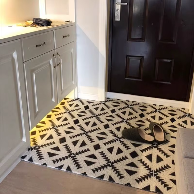 Le tapis de porte d'entrée peut être nettoyé avec un tapis de porte domestique en PVC. Le tapis d'entrée est un tapis de dessin animé résistant à la saleté