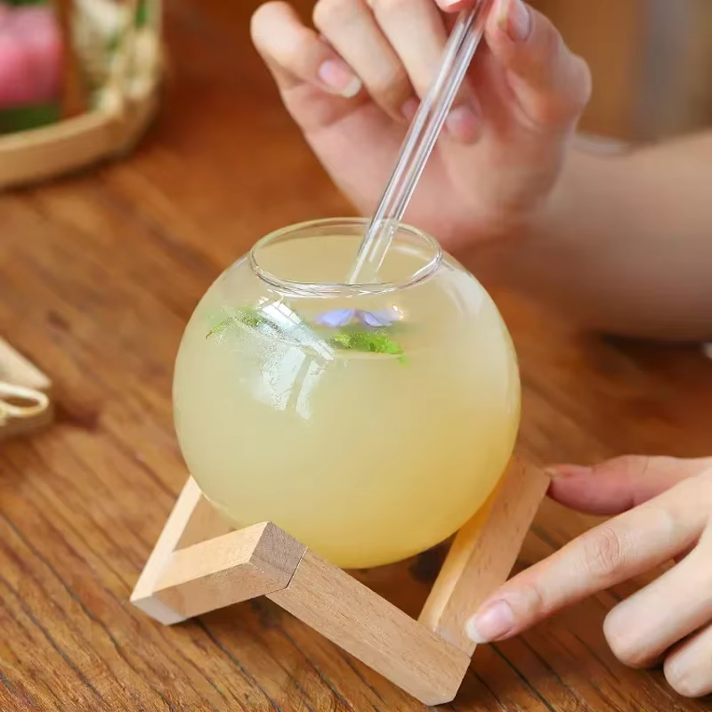 Tasse en verre de forme ronde lunaire créative avec support en bois